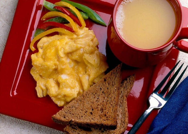 ** FOR USE WITH AP WEEKLY FEATURES ** Scrambled eggs are one of the classic dishes we make for breakfast, a meal that's increasingly being recognized as indispensable. Not only does breakfast provide essential early-morning nourishment to people of all ages throughout the week, it's also becoming more and more trendy for both business meetings and social gatherings. Any time families and friends want to get together in a relaxed setting they now consider breakfast. (AP Photo/American Egg Board)