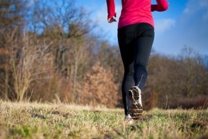 Jogging outdoors in a meadow