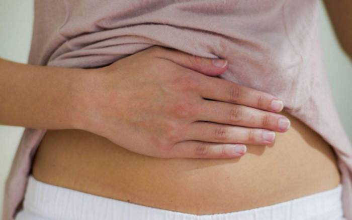 боль в животе