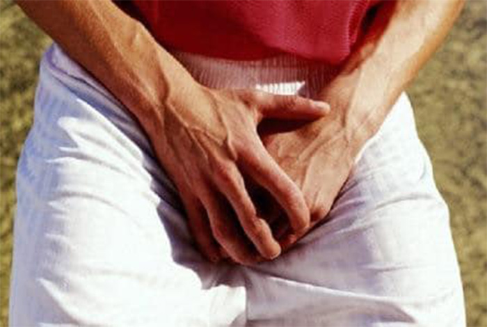 боли в мошонке